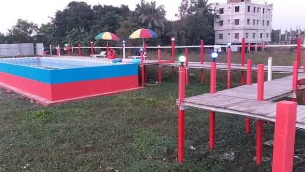 Dolphin over water resort